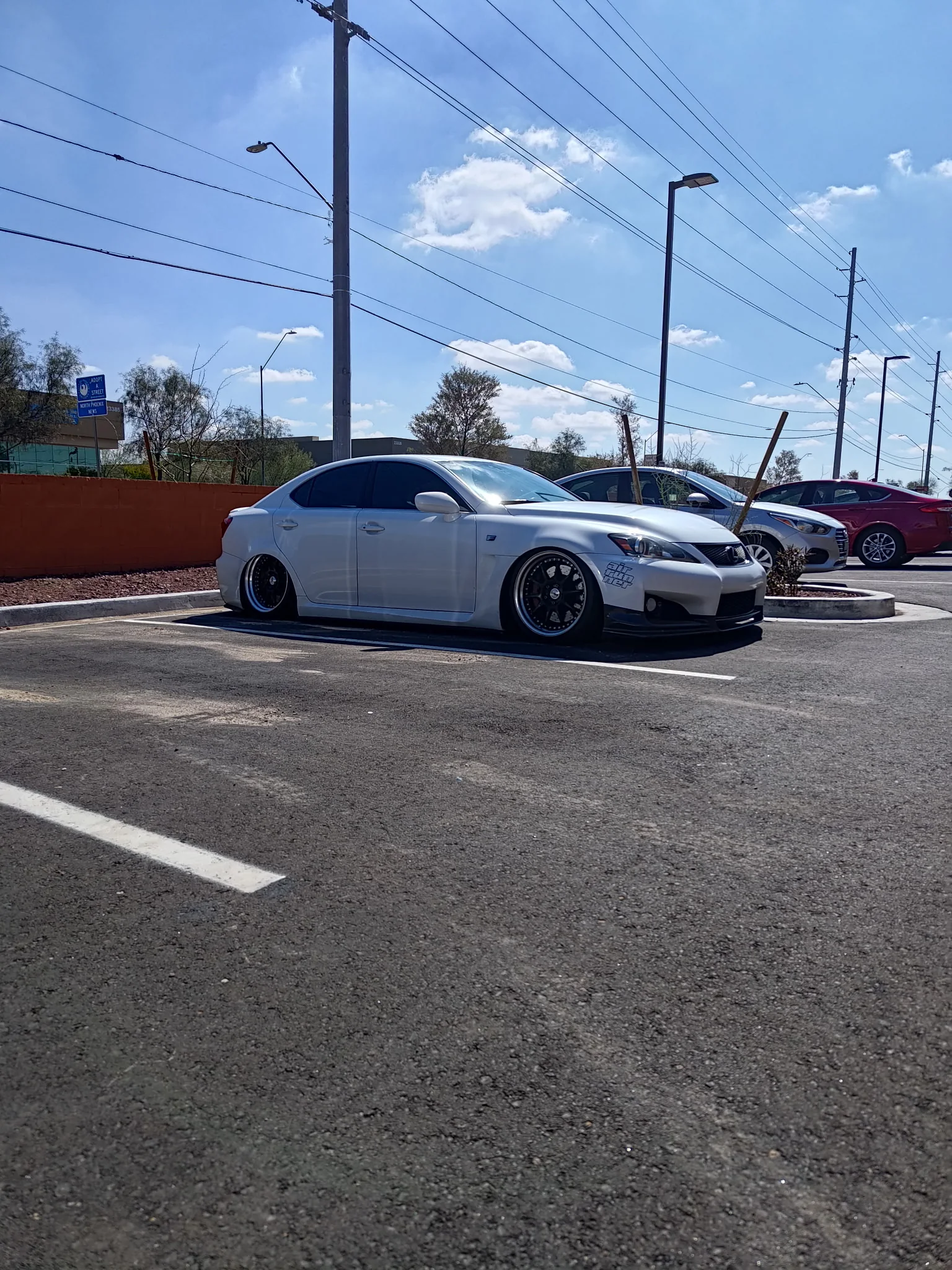 Lowered white Lexus IS F